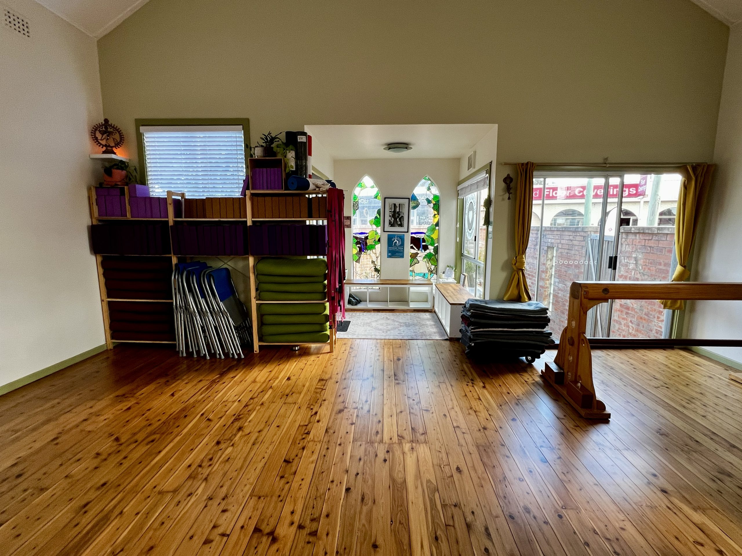 A light and airy yoga centre equipped with props 